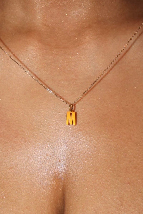 Initial | Collier