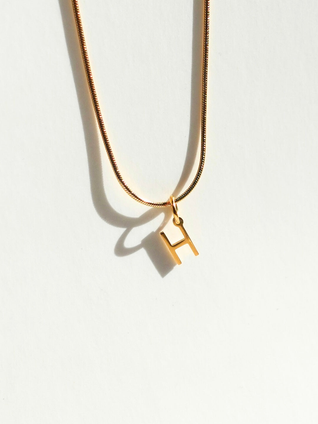 Initialement | Collier