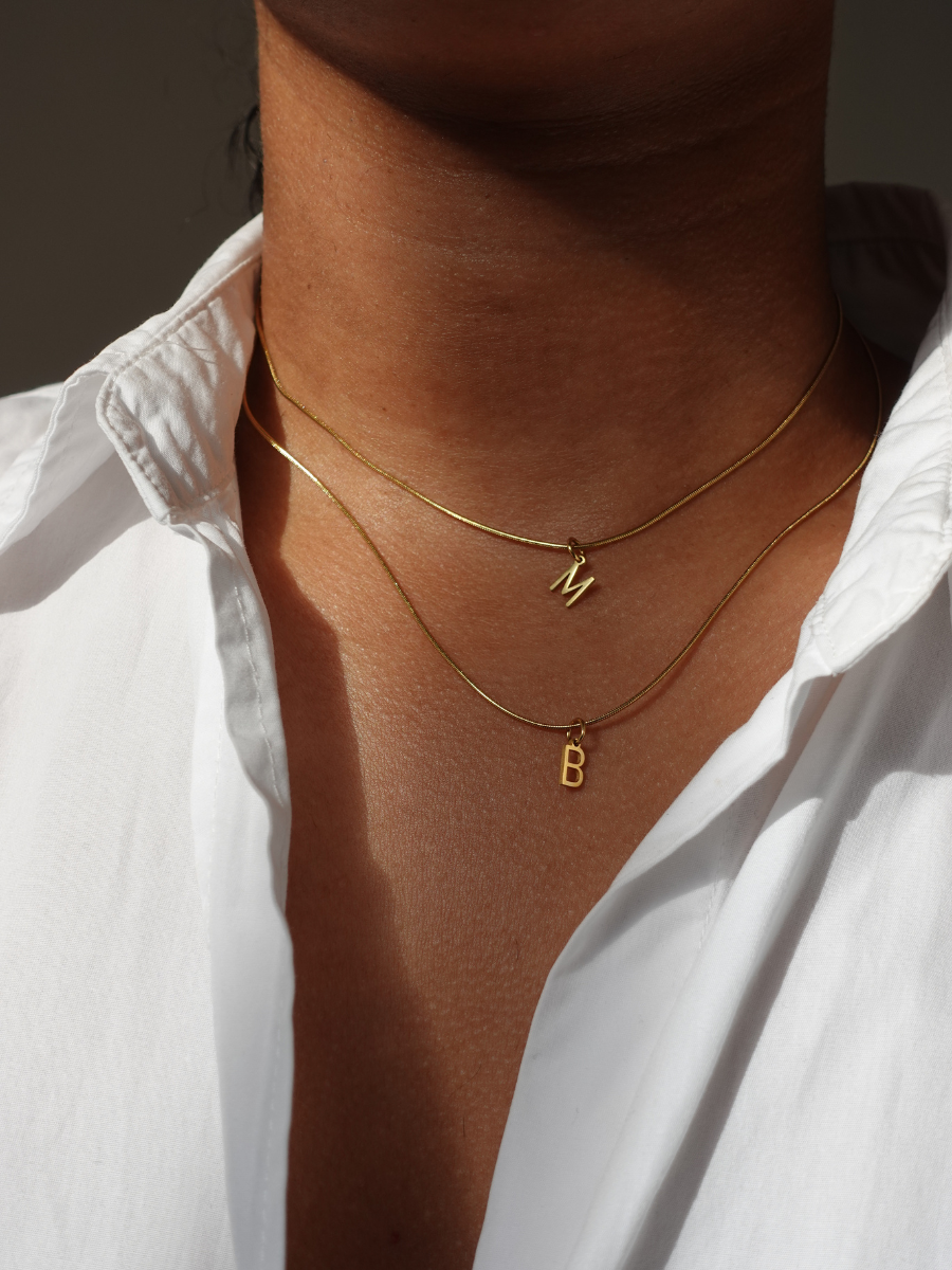 Initialement | Collier