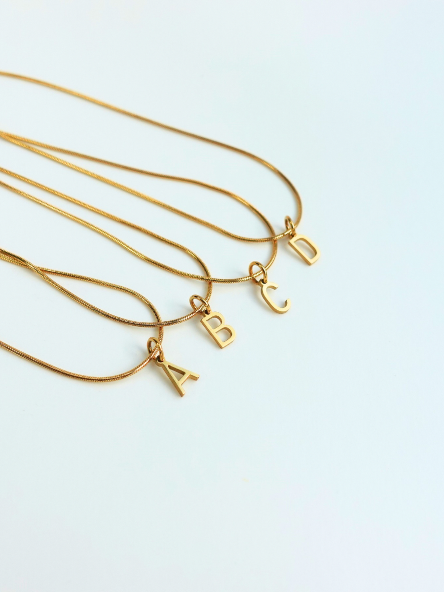 Initialement | Collier