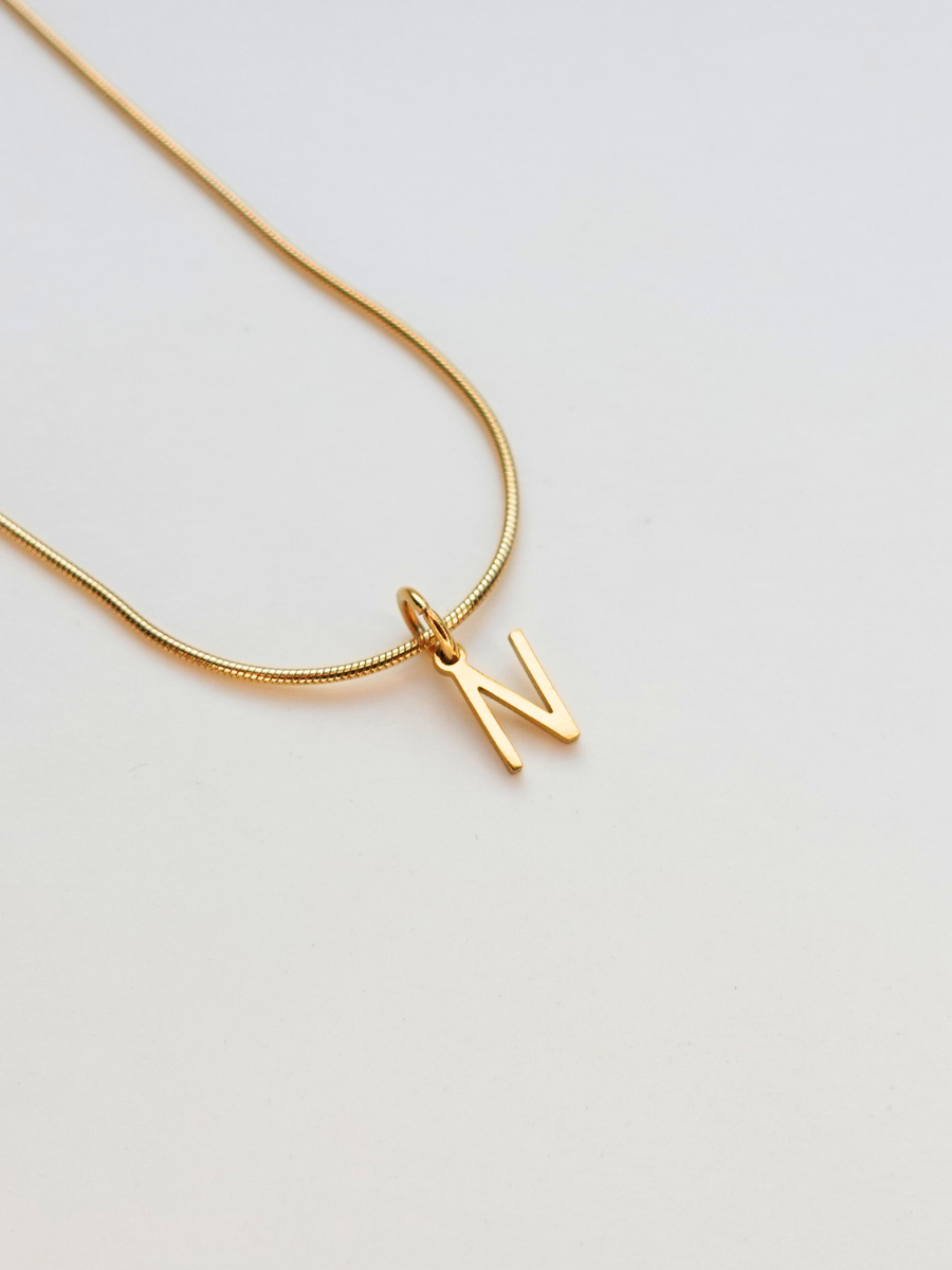 Initialement | Collier