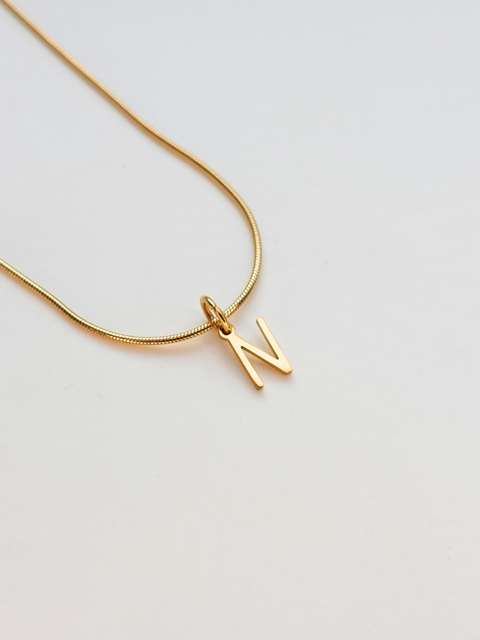 Initialement | Collier